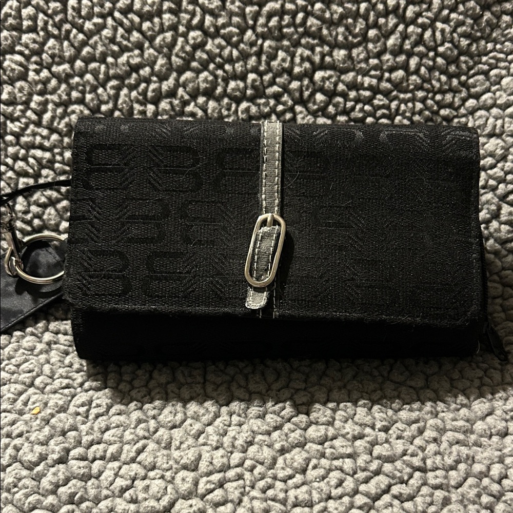 Black fabric wallet with organizer. Multiple slots and compartments.